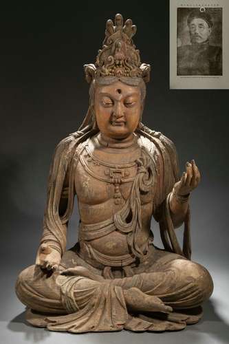 A Carved Wooden Seated Bodhisattva