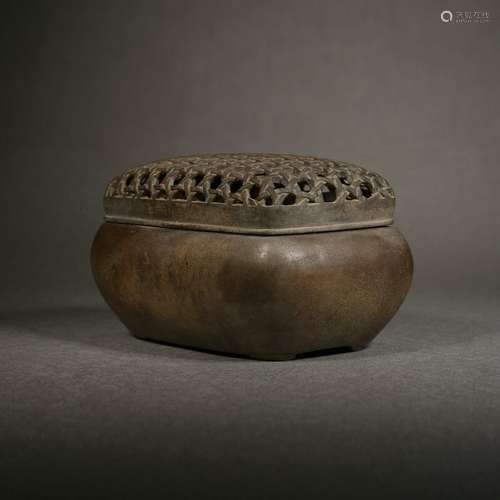 A bronze incense burner