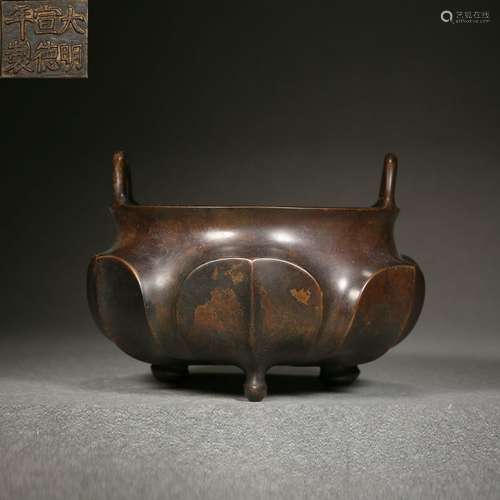 A bronze lotus censer