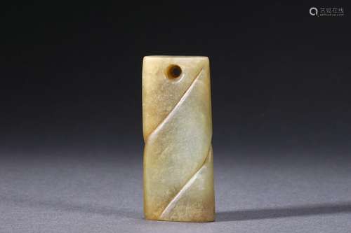 A Carved Jade Bead