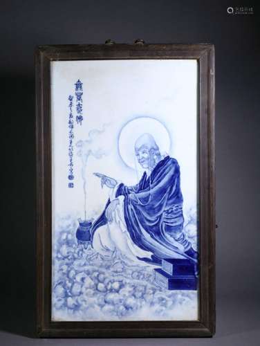 a blue and white porcelain plaque