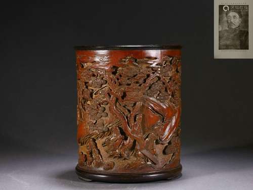 A carved bamboo figural story brushpot