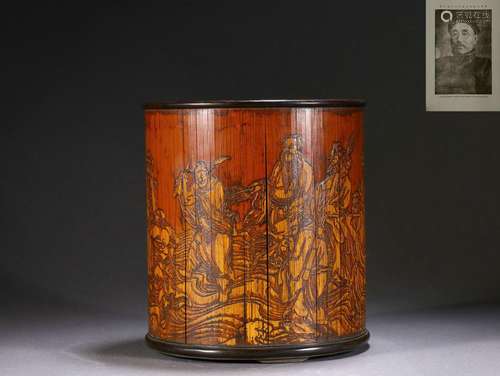 A carved bamboo brushpot