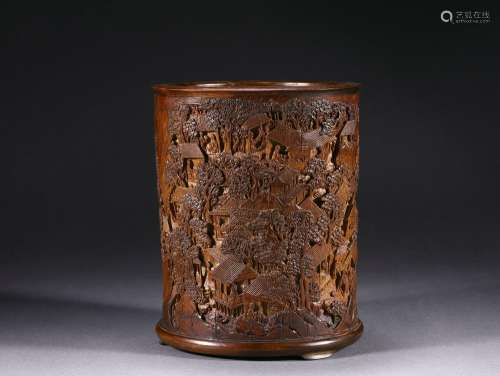 A carved bamboo brushpot