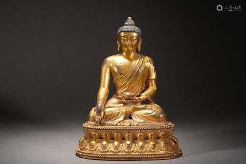 A bronze-gilt seated shakyamuni