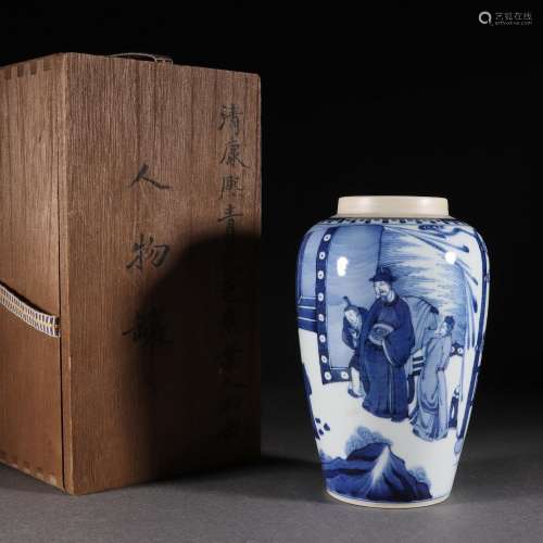 A blue and white figural story jar