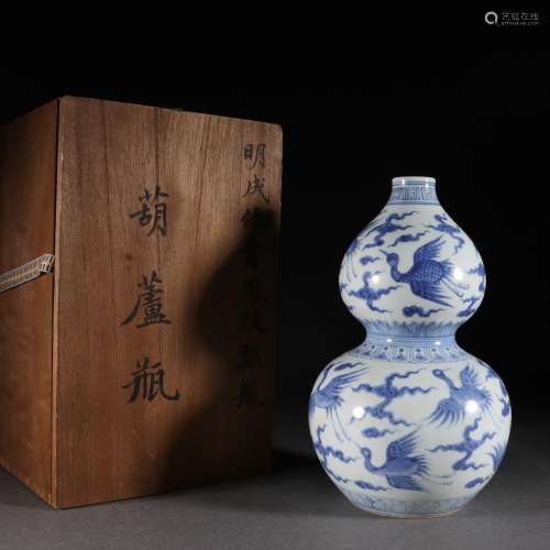 A blue and white phoenix double gourds vase