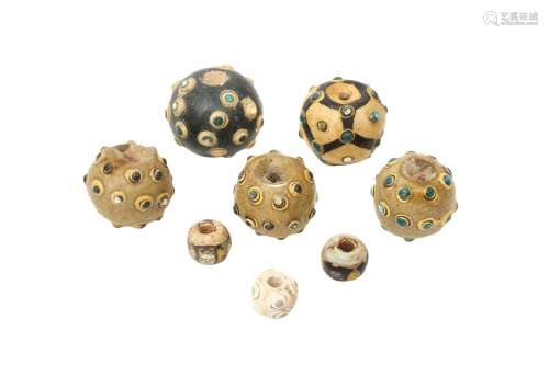 A GROUP OF EIGHT CHINESE GLASS 'EYE' BEADS 東周至漢 ...