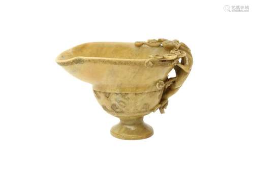 A CHINESE SOAPSTONE 'CHILONG' LIBATION CUP 十七或十八...