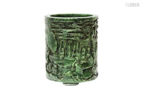 A CHINESE SPINACH-GREEN JADE 'SEVEN SAGES' BRUSH POT...