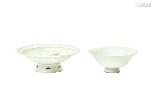 A CHINESE QINGBAI FOLIATE CUP AND STAND 北宋 青白釉葵式盞及盞...