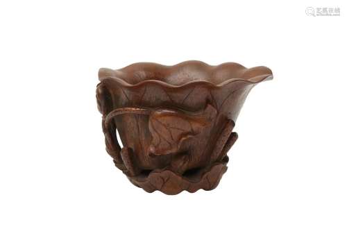 A CHINESE BAMBOO 'LOTUS' LIBATION CUP 清十九世紀 竹雕...