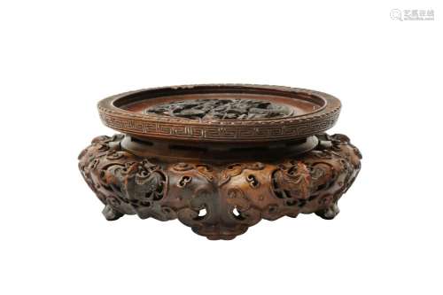 A CHINESE CARVED WOOD STAND 清十八世紀 龍趕珠紋木座