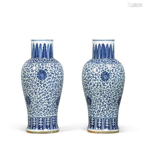 A pair of blue and white 'floral' vases, Qing dynast...