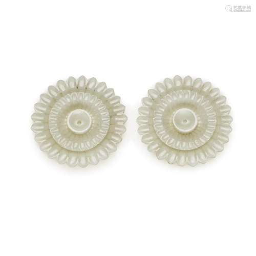 Two pale celadon jade ‘chrysanthemum’ plaques, 19th / 20th c...