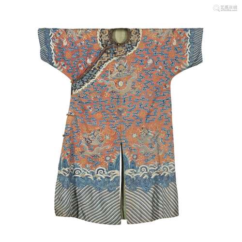 An apricot-ground kesi 'dragon' robe, Qing dynasty, ...