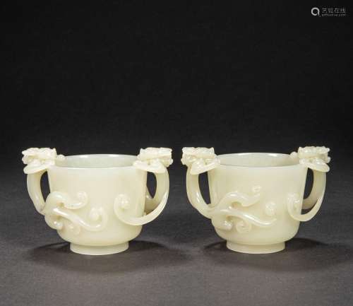 A PAIR OF CHINESE HETIAN JADE CUPS FROM QING DYNASTY