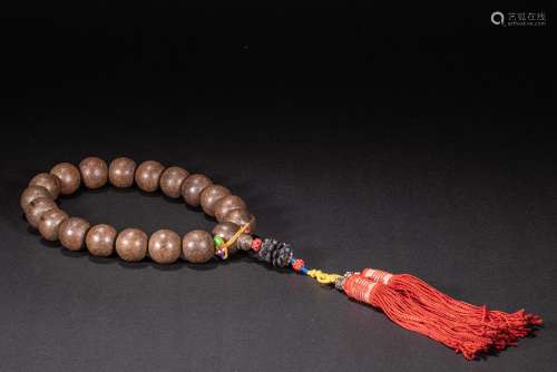 CHINESE AGARWOOD BUDDHA BEADS FROM THE QING DYNASTY