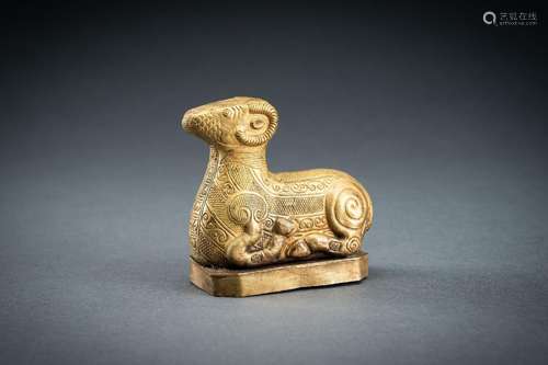 AN ARCHAISTIC FIRE-GILT COPPER REPOUSSÉ FIGURE OF A RAM