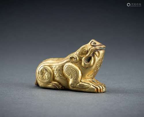 AN ARCHAISTIC FIRE-GILT COPPER REPOUSSÉ FIGURE OF A BOAR