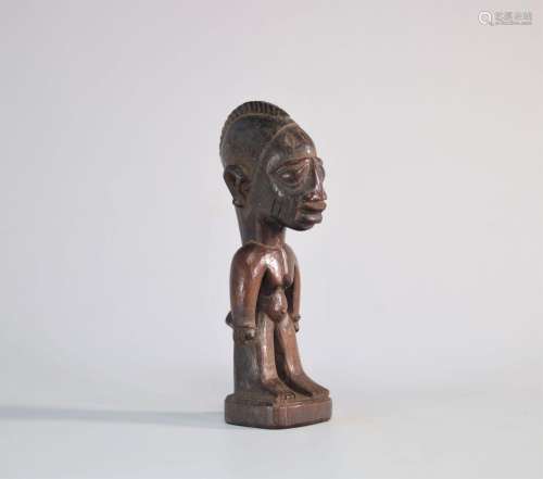 Ibeji yoruba statue féminine patine brune \nPoids: 220 g\nLi...