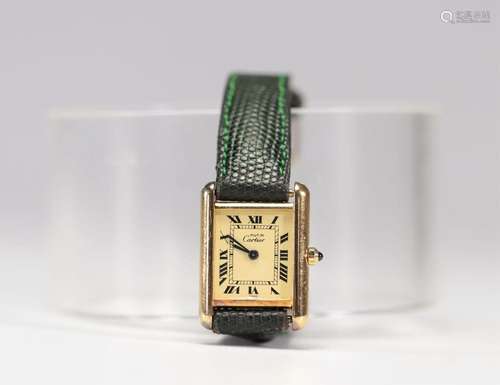 CARTIER Tank Must - Montre de dame en vermeil, mouvement qua...