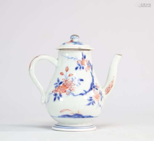 Théière en porcelaine de chine à décor de fleurs bleues et r...