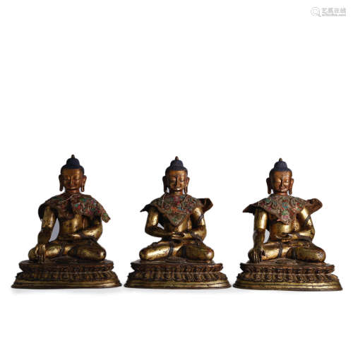 Set of Three Gilt-Bronze Statues of Buddha