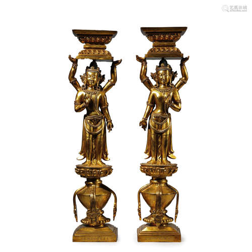 Pair of Gilt-Bronze Avalokitesvara Candlesticks