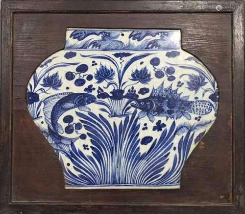 Porcelain plate with blue and white fish and algae pattern