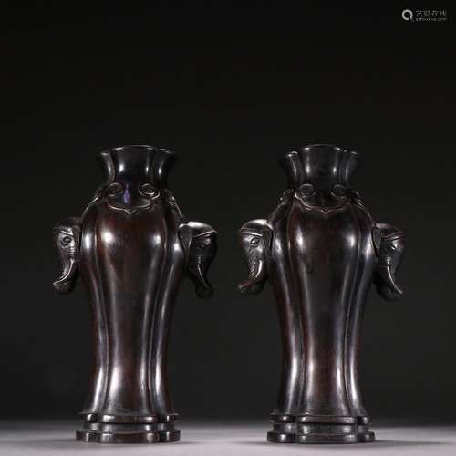 Pair of lobular rosewood ruyi pattern elephant ear bottles