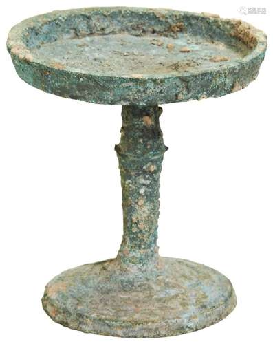 A BRONZE CANDLEHOLDER Han Dynasty (202BC - AD220) the dished...