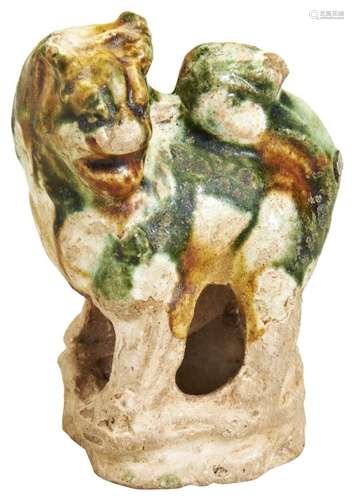 A MINIATURE SANCAI GLAZED LION TANG DYNASTY (AD 618-907) cov...