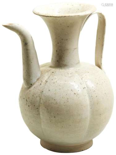 A QINGBAI EWER SONG DYNASTY OR LATER with a strap handle and...