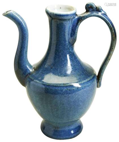 A POWDER-BLUE GLAZED WINE EWER 16TH /17TH CENTURY the balust...