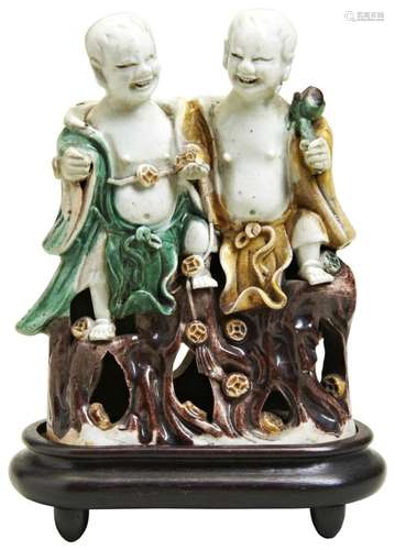 FAMILLE VERTE BISCUIT PORCELAIN MODEL OF THE LAUGHING TWINS,...