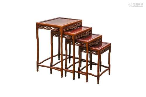 A NEST OF FOUR CHINESE WOOD TABLES 木套桌一組四張
