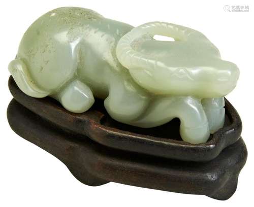 CELADON JADE BUFFALO 20TH CENTURY modelled recumbent on a fi...