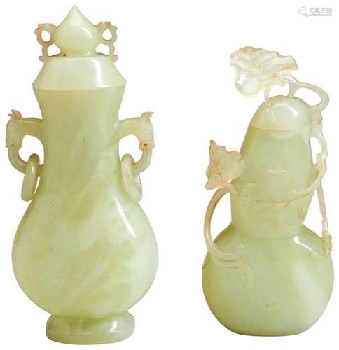 TWO CHINESE CELADON JADE VASES WITH COVERS, 20th century, on...