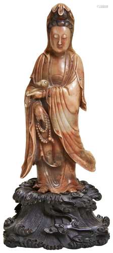 A CARVED SOAPSTONE GUANYIN 20TH CENTURY the finely carved st...