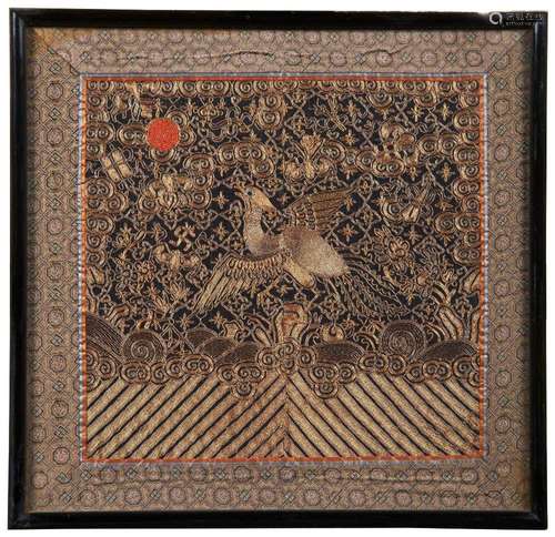 A CHINESE EMBROIDERED CIVIL RANK BADGE OF A PHEASANT QING DY...