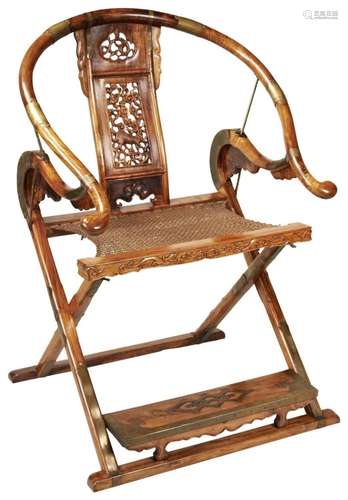 A HUANGHUALI HORSESHOE-BACK FOLDING CHAIR 20TH CENTURY the s...