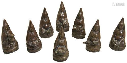 A SET OF EIGHT BRONZE FIGURES OF MONKS TIBETAN, LATE 19TH CE...