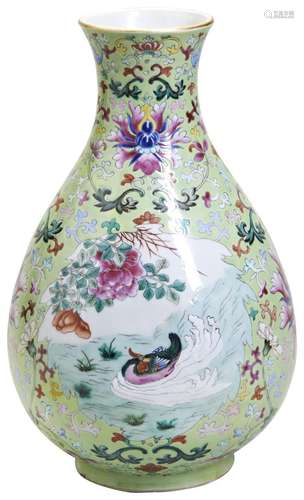 A FAMILLE ROSE LIME-GREEN GROUND BALUSTER VASE LATE QING DYN...