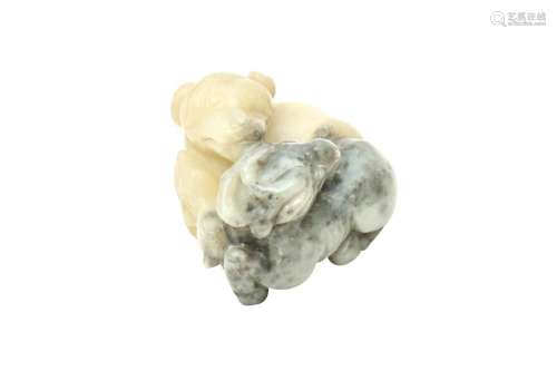 A CHINESE CREAM AND GREY JADE 'DOG AND RAM' CARVING 二十世紀...