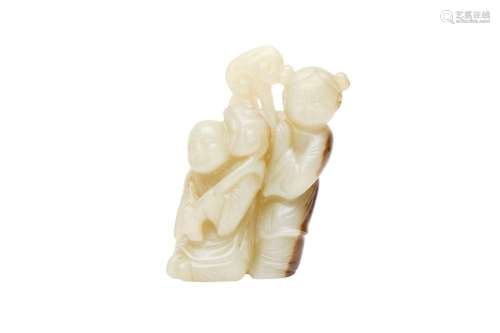 A CHINESE CELADON AND RUSSET JADE 'BOYS AND LINGZHI' CARVING...