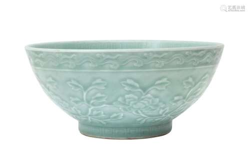 A CHINESE CELADON-GLAZED 'PEONIES' BOWL 青釉牡丹紋盌