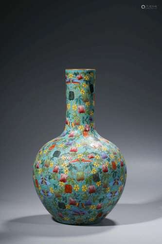 A TOURQUOISE GROND FAMILLE ROSE VASE.MARK OF QIANLONG