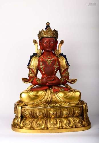 A GILT-BRONZE FIGURE OF AMITAYUS