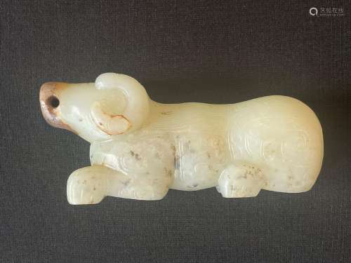 A WHITE JADE CARVING OF BEAST.WARRING STATES PERIOD